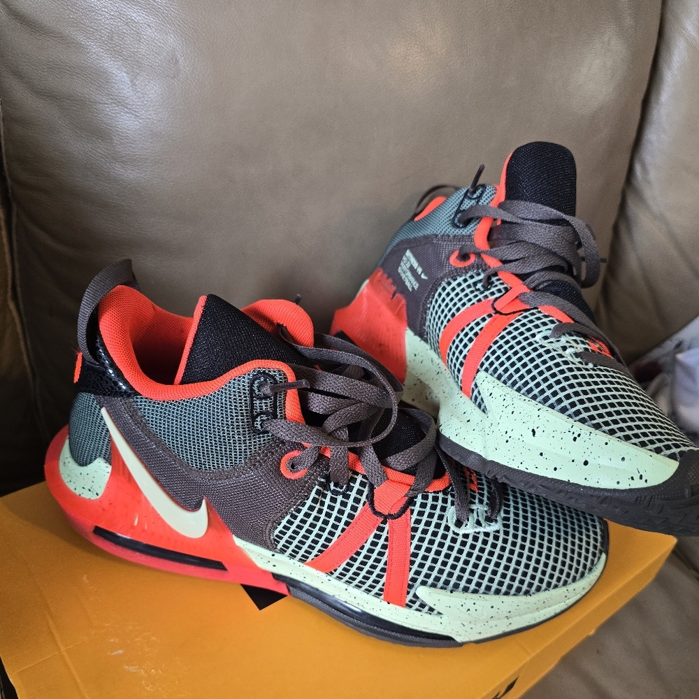 Nike Black and Red Sneakers with Breathable Mesh and Flexible Soles